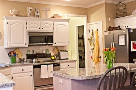 10 decorating ideas for above kitchen cabinets. Tips Decorating Above Kitchen Cabinets - My Kitchen ...