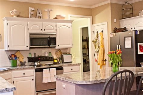 The second step in the kitchen drawers and kitchen cabinet organization challenge is removing the excess stuff from your cabinets and drawers, so there is actually room in them for what you want to store. Tips Decorating Above Kitchen Cabinets - My Kitchen ...