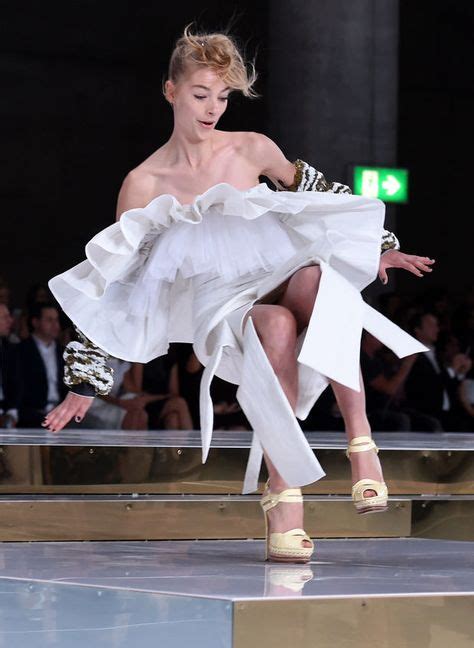 models falling on runway