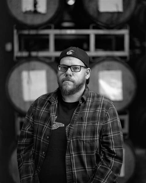Photographing Portraits Of Brewers And Developing The Film In Their