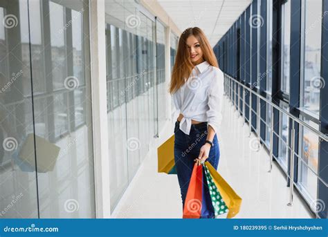 Fashion Shopping Girl Portrait Beauty Woman With Shopping Bags In Shopping Mall Shopper Sales