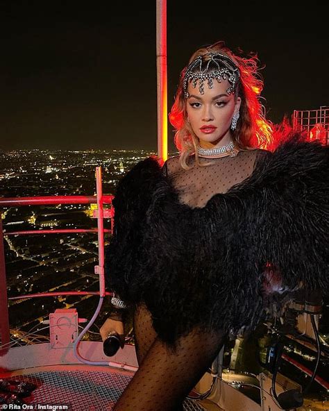 Rita Ora Puts On A Leggy Display In A Sheer Feathered Bodysuit