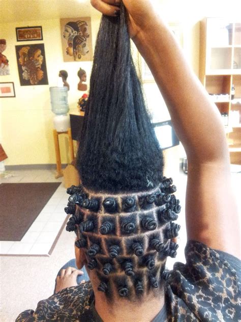 The transitioning hair that is neither short nor long enough can look awkward when undone, while being knotted, it make a classy hairstyle. Bantu Knots | Natural hair/hair styles. | Pinterest