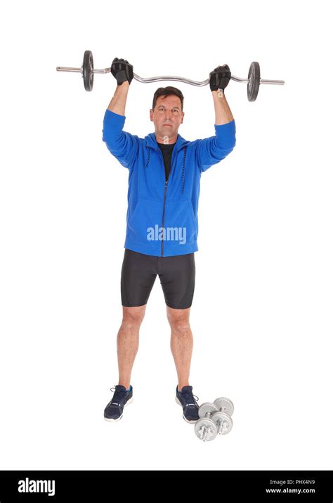 Tall Man Lifting The Weight Over His Head Stock Photo Alamy