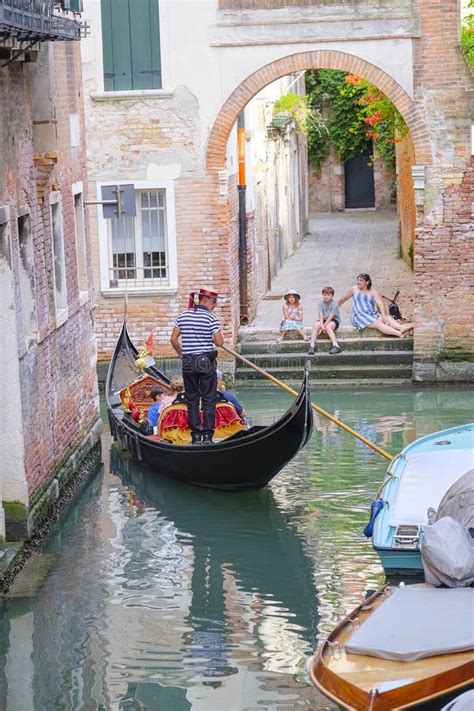 Gondola Sails Down The Channel In Venice Editorial Photo Image Of