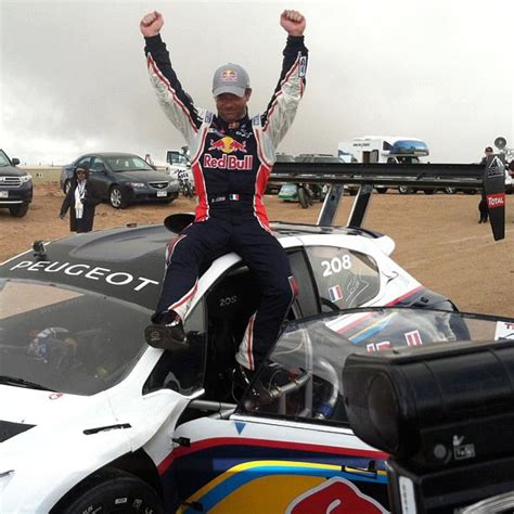 Rhys millen wins pikes peak first electric car victory. loeb-pikes-peak-record-peugeot | Les Voitures