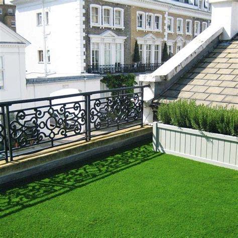 The artificial grass will be placed on the block and beam roof of a storage shed underneath. Polyethylene Low Cost Artificial Grass On Flat Roof 20-40 Mm Height