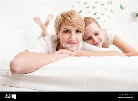 Women Lying On Bed Stock Photo Alamy