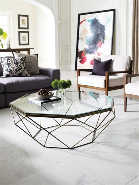 Use an adorable coffee table to display decor pieces and family photos. 5 Essentials for your coffee table - Daily Dream Decor