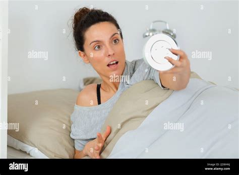 Shocked Young Woman Waking Up With Alarm Stock Photo Alamy