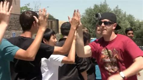 video watch the most high fives in one minute in this week s spotlight guinness world records