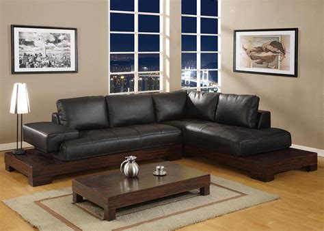Brown couches, especially dark brown leather ones, are often picked for their practicality and luxurious look. Black Furniture Living Room Ideas - HomesFeed