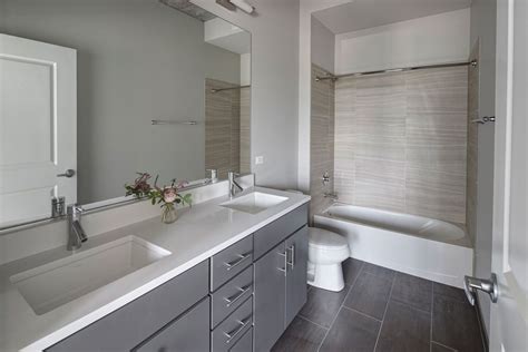 Modern Master Bathroom With Corian Counters And Drop In
