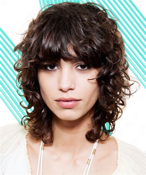 Flaunt Your Curls With These 20 Curly Hairstyles With Bangs