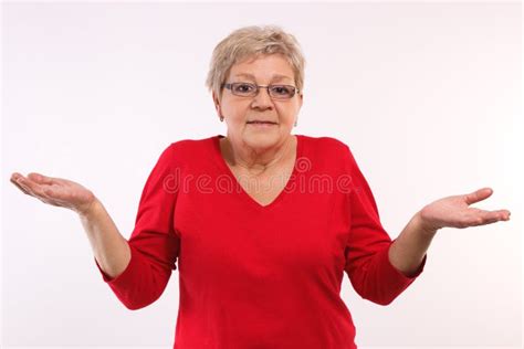Elderly Woman Shrugging Shoulders And Throwing Up Her Hands Emotions