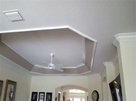 Clean the ceiling, removing dust, debris, or any current decoration that would interfere with painting. Tray Ceiling Trim Out - JSR Trim