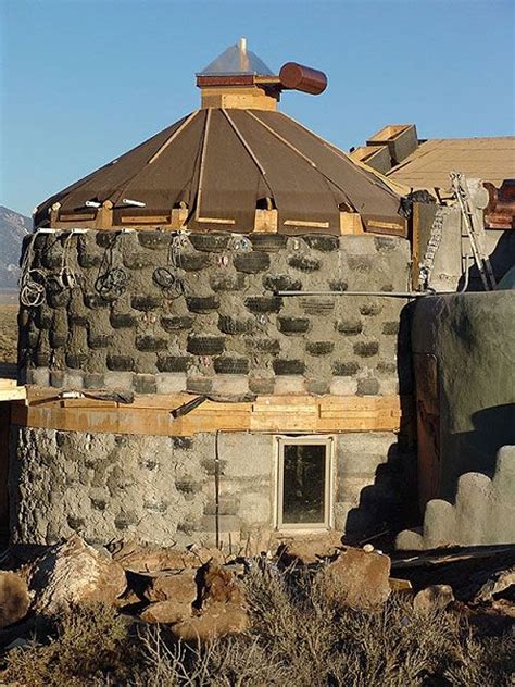 Earthship Use Of Tires And Rammed Earth Columnar Tower W Snow Ice