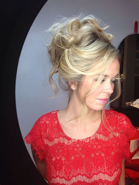 The blonde hair makes the female actress look so gorgeous and shiny from top to bottom. Brigitte Bardot hairstyle blonde updo chignon modern ...