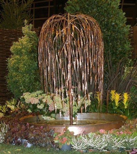 Susan's originals are then sent to a factory multiple paint colors are applied in thin layers, then rubbed off to produce a willow tree look and feel. 54 Garden Water Features: Awesome Outdoor Design Ideas ...