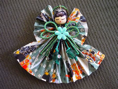 origami fan angel | Christmas origami, Origami christmas tree, Origami