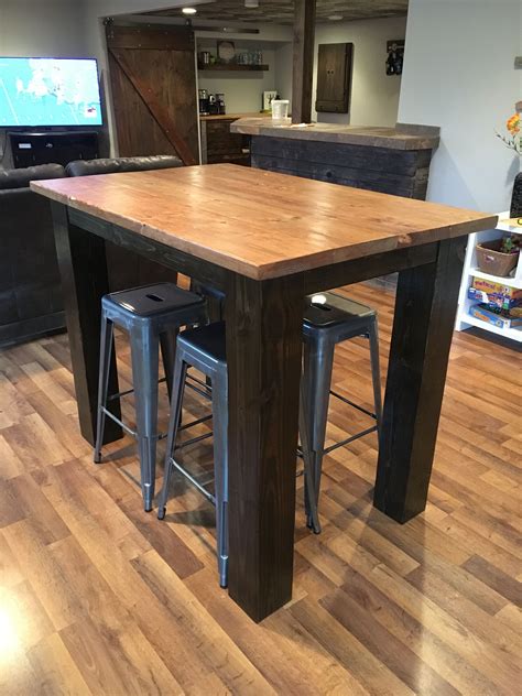 The timber is finished in a danish oil and the steel is left untouched for that natural industrial look. 42" High Pub Table w/ 6x6 Legs | Pub table and chairs, Table