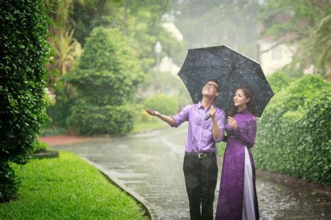 Vietnamese Couple In Traditional Clothes Ao Dai With Love Mood In The