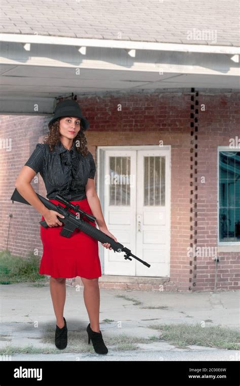 Woman With Assault Rifle Stock Photo Alamy