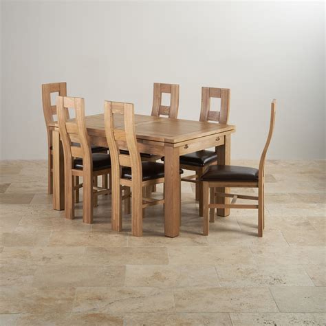 Beautiful australian oak dining table with 6 chairs (leather seats) all in excellent. Dorset Dining Set: Extending Table in Oak + 6 Leather Chairs