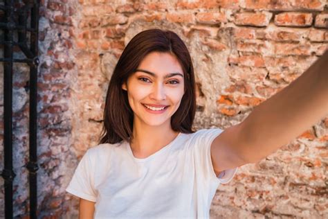 Free Photo Latin Woman Taking A Selfie