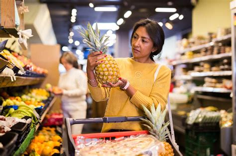 Woman Picking Ripe Pineapple At Supermarket Stock Image Image Of Offer Purchase 251415715