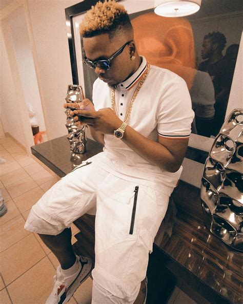 Nigerian Rapper Olamide Stuns In New Pictures