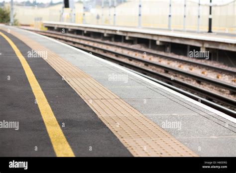Yellow Line On The Station Platform High Resolution Stock Photography