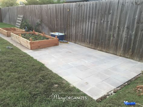This raised garden bed is simply stacked concrete blocks, filled with soil. How To Install A Paver Patio {The Foundation of My Raised ...