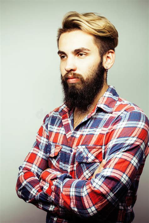 Portrait Of Young Bearded Hipster Guy Smiling On White Background Close