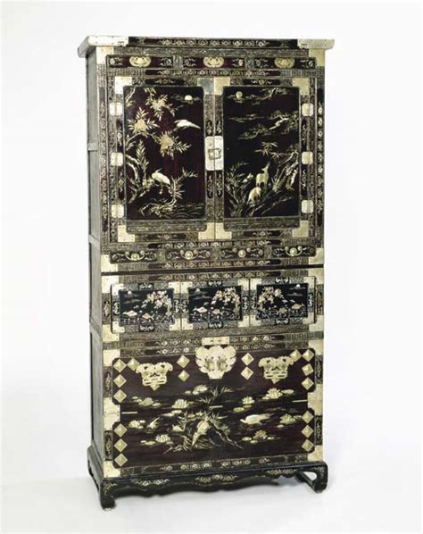 A Korean Black Lacquered And Mother Of Pearl Inlaid Three Section Chest