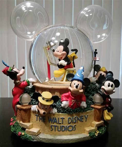 This Disneystore Musical Snowglobe Called Mickeymouse Through The