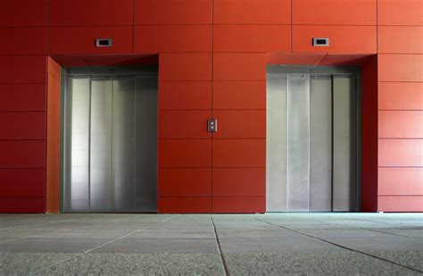 Two Elevator Doors In A Luxurious Building Rideau Elevator Services Inc