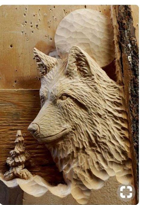 12 Wolf Carvings Ideas In 2021 Wolf Chainsaw Carving Wolf Sculpture