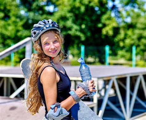 Teen Girl Drink Water And Rides His Skateboard Stock Image Image Of Female Activity 69014699