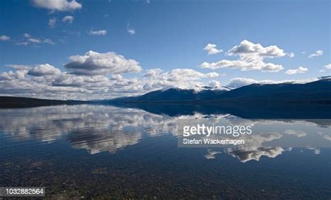 Vast Reflecting Sky In Quiet Lake South Canol Road Yukon Territory