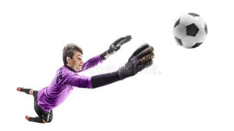 Goalkeeper In Action Goalkeeper Catching Ball In Jump The Concept Of
