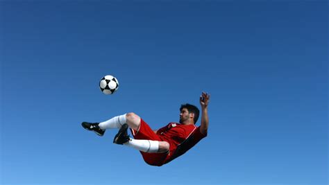 Soccer Player Kicking Ball In Mid Air Slow Motion Stock Footage Video