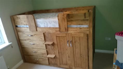 Our kids cabin beds are designed to accommodate children with ease with sizes including single cabin beds and more. 4 Drawer cabin bed in traditional stained pine with a ...