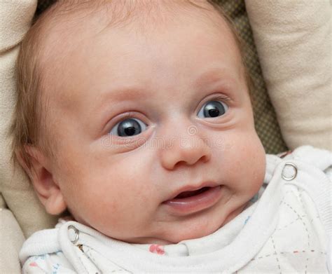 Baby Making A Funny Surprised Face Royalty Free Stock Photography