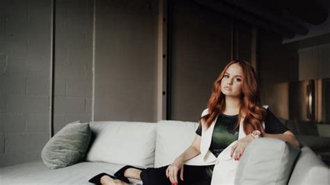 debby ryan is the spokeswoman for the don t look away relationship violence campaign glamour