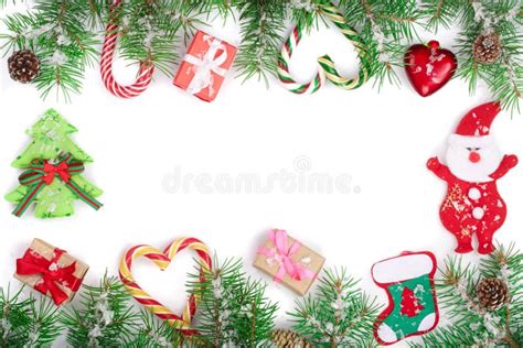 Christmas Frame Of Fir Tree Branch With Candy Canes And Boxes Isolated