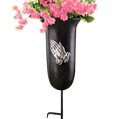 Stone flower urns help save space and substantially beautify any balcony, home, or public area in which they are placed. Outdoor Memorial Flower Vase with Stake, by Collections Etc