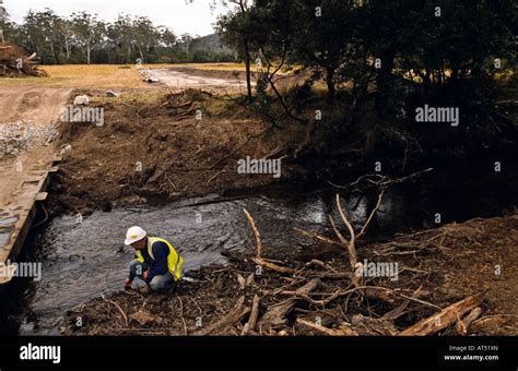 Laying Gas Pipeline Through Creek Stock Photo Alamy