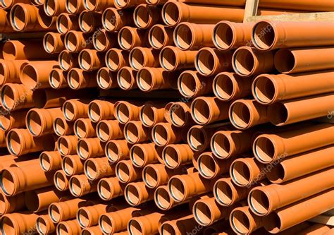 Stacked Pvc Orange Pipes ⬇ Stock Photo Image By © Grekoff 1201846