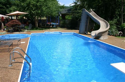 Pool Complete With Slide And Diving Board Pools